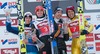 Second placed Stefan Kraft of Austria ( L ), Winner Richard Freitag of Germany ( C ) and the third placed Simon Ammann of Switzerland ( C ) and Noriaki Kasai of Japan ( R ) celebrate on podium during the awards ceremony for the 63rd Four Hills Tournament of FIS Ski Jumping World Cup at the Bergisel Schanze in Innsbruck, Austria on 2015/01/04.
