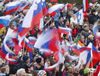 Spectators in outrun of the ski flying hill during the 35th race of Viessmann FIS ski jumping World cup season 2014-2015 in Planica, Slovenia. Ski flying competition of Viessmann FIS ski jumping World cup season 2014-2015 was held on Friday, 20th of March 2015 on HS225 ski flying hill in Planica, Slovenia.
