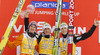 Winner Peter Prevc of Slovenia (M), second placed Severin Freund of Germany (L) and third placed Jurij Tepes of Slovenia (R) celebrate their medals for overall victory in the Viessmann FIS ski flying World cup season 2014-2015 in Planica, Slovenia. Final competition of Viessmann FIS ski jumping World cup season 2014-2015 was held on Sunday, 22nd of March 2015 on HS225 ski flying hill in Planica, Slovenia.
