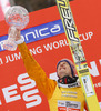 Winner Severin Freund of Germany celebrate his trophy for overall victory in the Viessmann FIS ski jumping World cup season 2014-2015 in Planica, Slovenia. Final competition of Viessmann FIS ski jumping World cup season 2014-2015 was held on Sunday, 22nd of March 2015 on HS225 ski flying hill in Planica, Slovenia.
