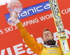 Winner Severin Freund of Germany celebrate his trophy for overall victory in the Viessmann FIS ski jumping World cup season 2014-2015 in Planica, Slovenia. Final competition of Viessmann FIS ski jumping World cup season 2014-2015 was held on Sunday, 22nd of March 2015 on HS225 ski flying hill in Planica, Slovenia.
