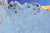 Ski down steep Y chute on NorthEast face of Vrtaca mountain above Ljubelj road pass near Trzic, Slovenia, on early morning of 17th of December 2020.