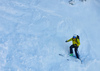 Ski down steep Y chute on NorthEast face of Vrtaca mountain above Ljubelj road pass near Trzic, Slovenia, on early morning of 17th of December 2020.