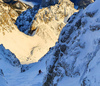 Ski down steep Y chute on NorthEast face of Vrtaca mountain above Ljubelj road pass near Trzic, Slovenia, on early morning of 17th of December 2020.