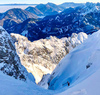 Climbing up the steep Y chute on NorthEast face of Vrtaca mountain above Ljubelj road pass near Trzic, Slovenia, on early morning of 17th of December 2020.