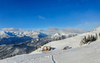 Ski touring in mountains above Jesenice, Slovenia, on windy but sunny 26th of December 2020. After 2 days of snowing mountains woke up in sunny day with 30cm of fresh snow, but also strong winds, which was drifting snow around.