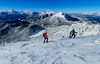 Ski touring in mountains above Jesenice, Slovenia, on windy but sunny 26th of December 2020. After 2 days of snowing mountains woke up in sunny day with 30cm of fresh snow, but also strong winds, which was drifting snow around.