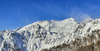 With early snow ski touring season in Julian Alps, Slovenia, started already in November. Skiers from were enjoying more then 70cm of fresh snow in perfect bluebird weather in mountains above Pokljuka, Slovenia, on 30th of November 2021.