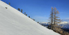 With early snow ski touring season in Julian Alps, Slovenia, started already in November. Skiers from were enjoying more then 70cm of fresh snow in perfect bluebird weather in mountains above Pokljuka, Slovenia, on 30th of November 2021.