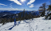 With early snow ski touring season in Julian Alps, Slovenia, started already in November. Skiers from were enjoying more then 70cm of fresh snow in perfect bluebird weather in mountains above Pokljuka, Slovenia, on 30th of November 2021.