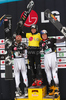 Winner Jasey Jay Anderson of Canada (M), second placed Andreas Prommegger of Austria (L) and third placed Benjamin Karl of Austria celebrate their medals won in parallel giant slalom of FIS Snowbord World Cup in Kreischberg, Austria. Parallel giant slalom of FIS Snowbord World Cupwas held in Kreischberg, Austria, on 6th of January 2010.
