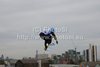 A snowboarder takes to the air competing in the training session of the FIS Snowboard Big Air World Cup and freestyle skiing show at the London Freeze Festival at Battersea Power Station, London.
