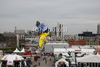 A snowboarder takes to the air competing in the training session of the FIS Snowboard Big Air World Cup and freestyle skiing show at the London Freeze Festival at Battersea Power Station, London.
