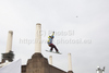 A snowboarder takes to the air competing in the training session of the FIS Snowboard Big Air World Cup and freestyle skiing show at the London Freeze Festival at Battersea Power Station, London.

