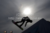 A snowboarder takes to the air competing in the training session of the FIS Snowboard Big Air World Cup and freestyle skiing show at the London Freeze Festival at Battersea Power Station, London.
