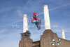 A snowboarder takes part in a training session prior to competing in the FIS Snowboard Big Air World Cup at the London Freeze Festival at Battersea Power Station, London.
