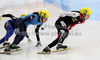 Katherine Reutter of USA and Jessica Hewitt of Canada during World short track speed skating team World championships, which was held on 20th of March 2011 in Warszawa, Poland.
