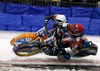 Sergey Makarov of Russia and Rene Stellingwerf of Netherlands during FIM Icespeedway World Championship GP at the Roundcourse in Assen, Netherlands on 2014/03/09.
