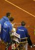 Jarkko Nieminen (L) and Harri Heliovaara of Finland (M) with captain of team Finland, Kim Tiilikainen (R) during doubles match of Davis Cup between Slovenia and Finland. Match between Jarkko Nieminen and Harri Heliovaara of Finland, and Gregor Zemlja, and Luka Gregorc of Slovenia was held in Tivoli Arena in Ljubljana, Slovenia, on Saturday, 5th of March 2011.
