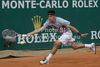 Bernard Tomic (AUS)  in action during the second round match between Bernard Tomic (AUS) and Alexandr Dolgopolov (UKR)  at the ATP Monte Carlo Masters tennis tournament held in the Monte Carlo Country Club, Monaco..
