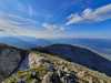 Mountain running to Stol and Vrtaca, mountains in Karavanke, near Trzic, Slovenia. Mountain running is popular sport that takes runners out of cities into unspoiled nature surrounded by highest mountains. Trails around highest Slovenian peaks are astonishingly beautiful, and can offer views over big part of the country if weather plays along.