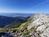 Mountain running to Stol and Vrtaca, mountains in Karavanke, near Trzic, Slovenia. Mountain running is popular sport that takes runners out of cities into unspoiled nature surrounded by highest mountains. Trails around highest Slovenian peaks are astonishingly beautiful, and can offer views over big part of the country if weather plays along.