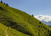 Mountain running around Begunjscica, 2060m high mountain ridge in Karavanke, near Trzic, Slovenia. Mountain running is popular sport that takes runners out of cities into unspoiled nature surrounded by highest mountains. Trails around highest Slovenian peaks are astonishingly beautiful, and can offer views over big part of the country if weather plays along.