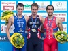 Second placed Dmitry Polyanskiy (RUS), winner Alistair Brownlee (GBR), and third placed Vicente Hernandez (ESP) celebrates at the flower ceremony during the men Elite competition of the Triathlon European Championships at the Schwarzsee in Kitzbuehel, Austria on 21.6.2014.
