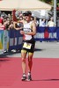 Nils Frommhold (Triathlon Potsdam) feiert beim Zieleinlauf seinen zweiten Platz beim 70.3 Luxembourg // during the Ergo Ironman 70.3 in Remich, Luxembourg on 2014/06/21.
