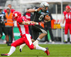 Mark De Swart, (Helsinki Roosters, LB, #3) und Kyle Callahan, (SWARCO Raiders Tirol, QB, #6) during quarterfinal match of European Football League between Swarco Raiders Tirol, Innsbruck, Austria, and Helsinki Roosters, Finland. Quarterfinal match of European Football League between Swarco Raiders Tirol and Helsinki Roosters was played on Saturday, 25th of May 2013 in Innsbruck, Austria.
