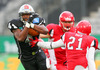 Talib Wise, (SWARCO Raiders Tirol, WR, #4) und Ranta Sampo, (Helsinki Roosters, DB, #21) during quarterfinal match of European Football League between Swarco Raiders Tirol, Innsbruck, Austria, and Helsinki Roosters, Finland. Quarterfinal match of European Football League between Swarco Raiders Tirol and Helsinki Roosters was played on Saturday, 25th of May 2013 in Innsbruck, Austria.
