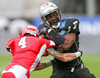 Pekka Rantala, (Helsinki Roosters, DB, #4) und Jaycen Taylor Spears, (SWARCO Raiders Tirol, RB, #7) during quarterfinal match of European Football League between Swarco Raiders Tirol, Innsbruck, Austria, and Helsinki Roosters, Finland. Quarterfinal match of European Football League between Swarco Raiders Tirol and Helsinki Roosters was played on Saturday, 25th of May 2013 in Innsbruck, Austria.
