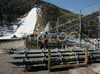With 3 weeks to go, ski flying hill in Planica, Slovenia is slowly getting its final shape. Workers are preparing for FIS Ski jumping World Cup finals, which will be held in Planica, Slovenia between 13th and 16th of March 2008. Snow canons are resting already, since organizers provided enough snow to cover ski jumping hill even though current temperatures go up to +10 degrees.
