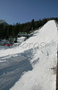 With 3 weeks to go, ski flying hill in Planica, Slovenia is slowly getting its final shape. Workers are preparing for FIS Ski jumping World Cup finals, which will be held in Planica, Slovenia between 13th and 16th of March 2008. Snow canons are resting already, since organizers provided enough snow to cover ski jumping hill even though current temperatures go up to +10 degrees.
