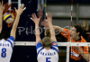Tine Urnaut of ACH Volley Bled (R) spikes between Semen Poltavskiy of Dinamo Moscow (L) and Sergey Grankin of Dinamo Moscow (M) during match of Indesit European Champions volleyball league. Match between ACH Volley, Bled, Slovenia, and Dinamo Moscow, Russia was played on 23rd of January 2008 in Tivoli Arena in Ljubljana, Slovenia. Match was by Dinamo Moscow who defeated ACH Volley with 0:3.
