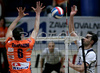 Andrej Berdon of OK Salonit Anhovo (R) spikes over Mitja Gasparini of ACH Volley Bled (L) during first match of Slovenian National Championships finals between ACH Volley, Bled, Slovenia and OK Salonit Anhovo, Slovenia. Match was won by ACH Volley Bled who defeated OK Salonit Anhovo with 3:0. Match was played in Radovljica, Slovenia on 12th of April 2008.
