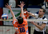 Andrej Kovacic of OK Salonit Anhovo (R) spikes over Rok Satler of ACH Volley Bled (L) during first match of Slovenian National Championships finals between ACH Volley, Bled, Slovenia and OK Salonit Anhovo, Slovenia. Match was won by ACH Volley Bled who defeated OK Salonit Anhovo with 3:0. Match was played in Radovljica, Slovenia on 12th of April 2008.
