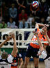 Mitja Gasparini of ACH Volley Bled (M) spikes between Roberto Carlos Brito da Purificacao of OK Salonit Anhovo (L) and Andrej Berdon of OK Salonit Anhovo (R) during first match of Slovenian National Championships finals between ACH Volley, Bled, Slovenia and OK Salonit Anhovo, Slovenia. Match was won by ACH Volley Bled who defeated OK Salonit Anhovo with 3:0. Match was played in Radovljica, Slovenia on 12th of April 2008.
