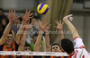 Alen Sket (no.5) of ACH Volley (L), Matevz Kamnik (no.7) of ACH Volley (M) and Andrej Flajs (no.1) of ACH Volley (R) in block while Igor Omrcen (no.15) of Lube Banca Marche Macerata (R) is trying to spike through block during match of CEV Indesit Volleyball Champions League between ACH Volley, Bled, Slovenia and Lube Banca Marche Macerata, 	Macerata, Italy. Match of CEV Indesit Volleyball Champions League between ACH Volley and Lube Banca Marche Macerata was played in Tivoli Arena, Ljubljana, Slovenia, on Wednesday, 10th of February 2010.
