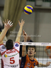 Valerio Vermiglio (no.5) of Lube Banca Marche Macerata (L) and Oliver Venno (no.8) of ACH Volley (R) during match of CEV Indesit Volleyball Champions League between ACH Volley, Bled, Slovenia and Lube Banca Marche Macerata, 	Macerata, Italy. Match of CEV Indesit Volleyball Champions League between ACH Volley and Lube Banca Marche Macerata was played in Tivoli Arena, Ljubljana, Slovenia, on Wednesday, 10th of February 2010.
