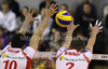 Matteo Martino (no.10) of Lube Banca Marche Macerata (L) and Matias Raymaekers (no.2) of Lube Banca Marche Macerata (R) in block during match of CEV Indesit Volleyball Champions League between ACH Volley, Bled, Slovenia and Lube Banca Marche Macerata, 	Macerata, Italy. Match of CEV Indesit Volleyball Champions League between ACH Volley and Lube Banca Marche Macerata was played in Tivoli Arena, Ljubljana, Slovenia, on Wednesday, 10th of February 2010.
