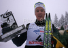 Third placed Jesper Modin of Sweden celebrating his medal won in  Men sprint race of Viessmann Cross country skiing FIS World Cup 2009-10. Men sprint race of Viessmann Cross country skiing FIS World Cup were held in Rogla, Slovenia, on 19th of December 2009.
