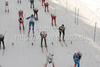 Skiers heading for course after start of Women 15km classic mass start race of Viessmann Cross country skiing FIS World Cup 2009-10. Women 15km classic mass start race of Viessmann Cross country skiing FIS World Cup were held in Rogla, Slovenia, on 20th of December 2009.
