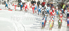 Skiers heading for course after start of Women 15km classic mass start race of Viessmann Cross country skiing FIS World Cup 2009-10. Women 15km classic mass start race of Viessmann Cross country skiing FIS World Cup were held in Rogla, Slovenia, on 20th of December 2009.
