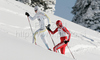 Hanna Brodin of Sweden (L) and Doris Trachsel of Switzerland (R) skiing in Women 15km classic mass start race of Viessmann Cross country skiing FIS World Cup 2009-10. Women 15km classic mass start race of Viessmann Cross country skiing FIS World Cup were held in Rogla, Slovenia, on 20th of December 2009.
