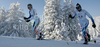 Marianna Longa of Italy (L) and Kristina Smigun-Vaehi of Estonia (R) skiing in Women 15km classic mass start race of Viessmann Cross country skiing FIS World Cup 2009-10. Women 15km classic mass start race of Viessmann Cross country skiing FIS World Cup were held in Rogla, Slovenia, on 20th of December 2009.
