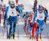 Maurice Manificat of France (M) nad Sergey Shiriaev of Russia (R) skiing in Men 30km classic mass start race of Viessmann Cross country skiing FIS World Cup 2009-10. Men 30km classic mass start race of Viessmann Cross country skiing FIS World Cup were held in Rogla, Slovenia, on 20th of December 2009.
