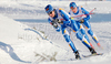 Martti Jylhae of Finland (L) and Lasse Paakkonen of Finland (R) skiing in Men 30km classic mass start race of Viessmann Cross country skiing FIS World Cup 2009-10. Men 30km classic mass start race of Viessmann Cross country skiing FIS World Cup were held in Rogla, Slovenia, on 20th of December 2009.
