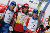 Winner Petter Northug of Norway (M), second placed Alexander Legkov of Russia (L) and third placed Maxim Vylegzhanin of Russia (R) celebrating their medals won in Men 30km classic mass start race of Viessmann Cross country skiing FIS World Cup 2009-10. Men 30km classic mass start race of Viessmann Cross country skiing FIS World Cup were held in Rogla, Slovenia, on 20th of December 2009.8
