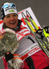 Winner Petra Majdic of Slovenia celebrates her medal won in women sprint race of Dobiacco-Toblach stage of Tour de Ski 2011. Sprint race of Tour de ski was held on Wednesday, 5th of January 2011 in Dobiacco-Toblach, Italy.
